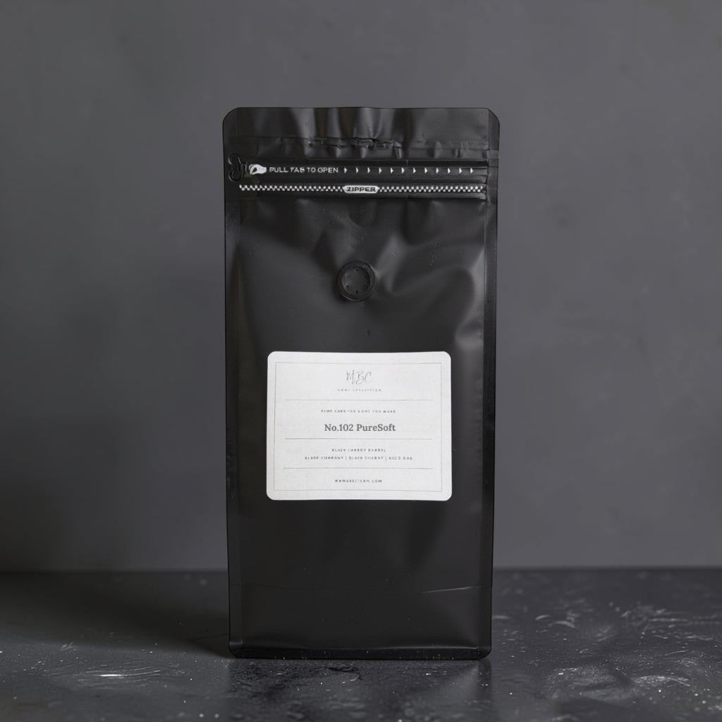 A matte black stand-up pouch of coffee with a white label reading 'HSC Coffee Roasting Co. No.